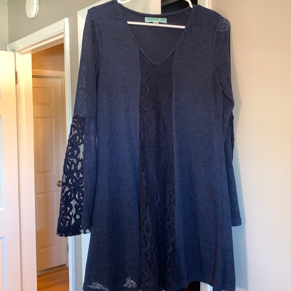 Navy v-neck dress with beautiful lace detail.